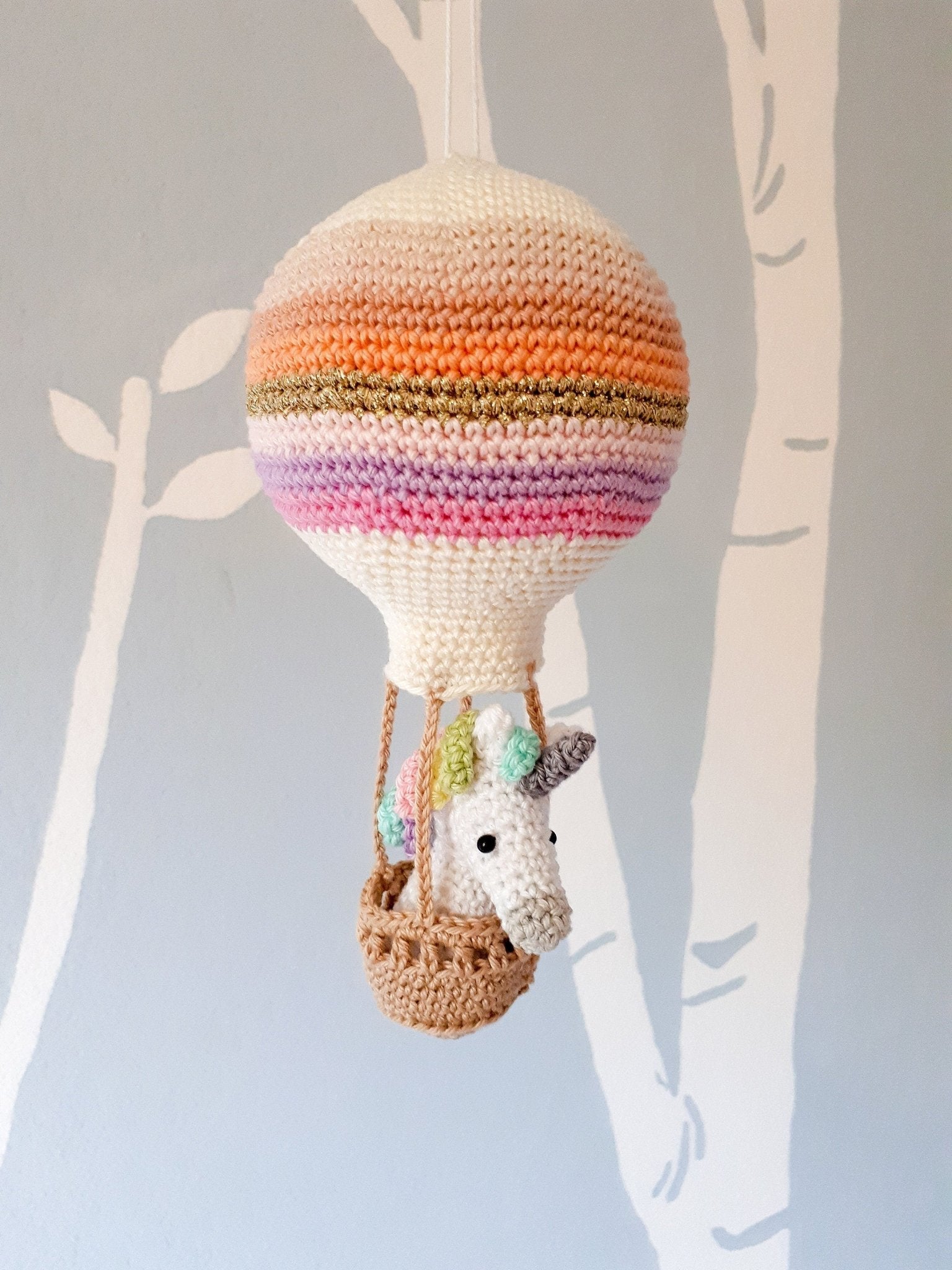 Crochet pattern amigurumi unicorn in a hot air balloon - Crochet on a tree