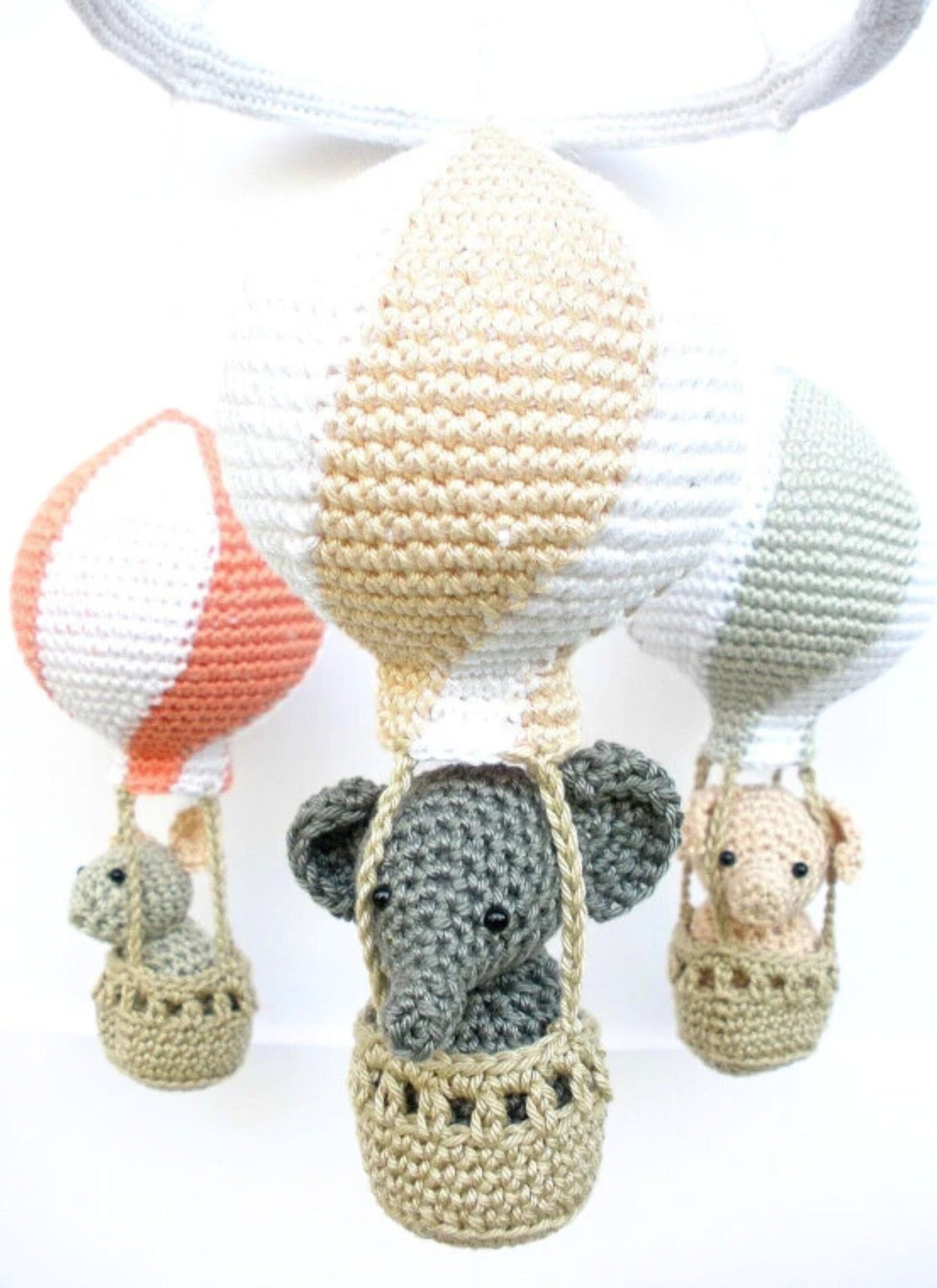 Peach hot air balloons baby mobile - Crochet on a tree