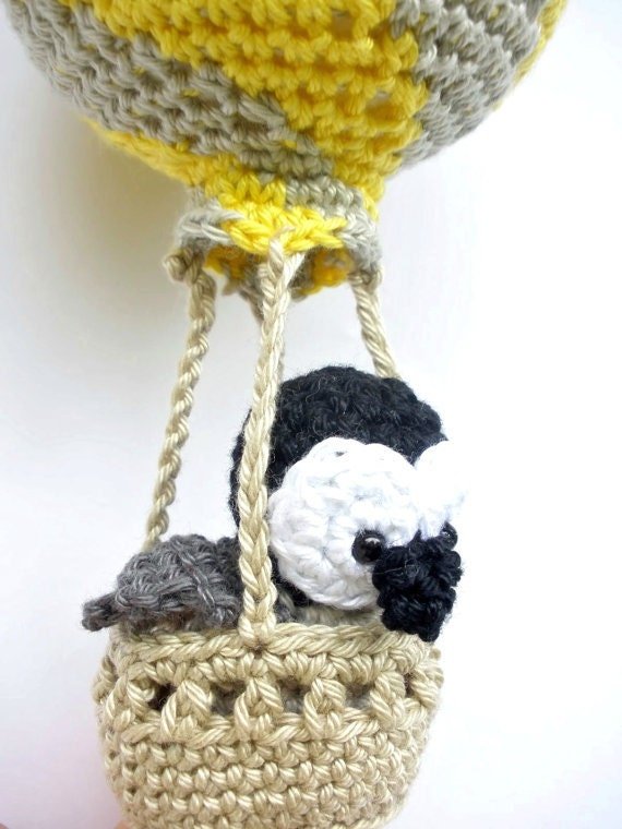 Penguin in a yellow hot air balloon nursery decoration - Crochet on a tree