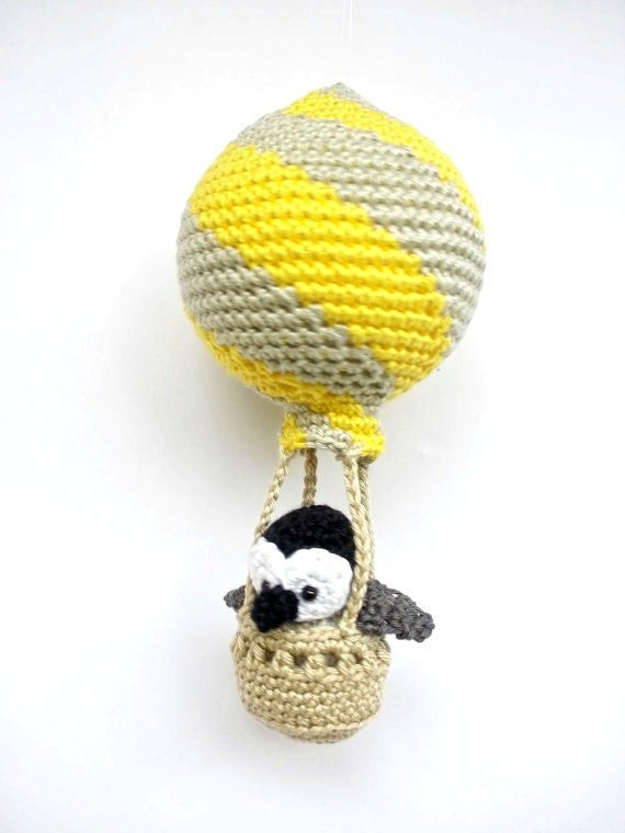 Penguin in a yellow hot air balloon nursery decoration - Crochet on a tree