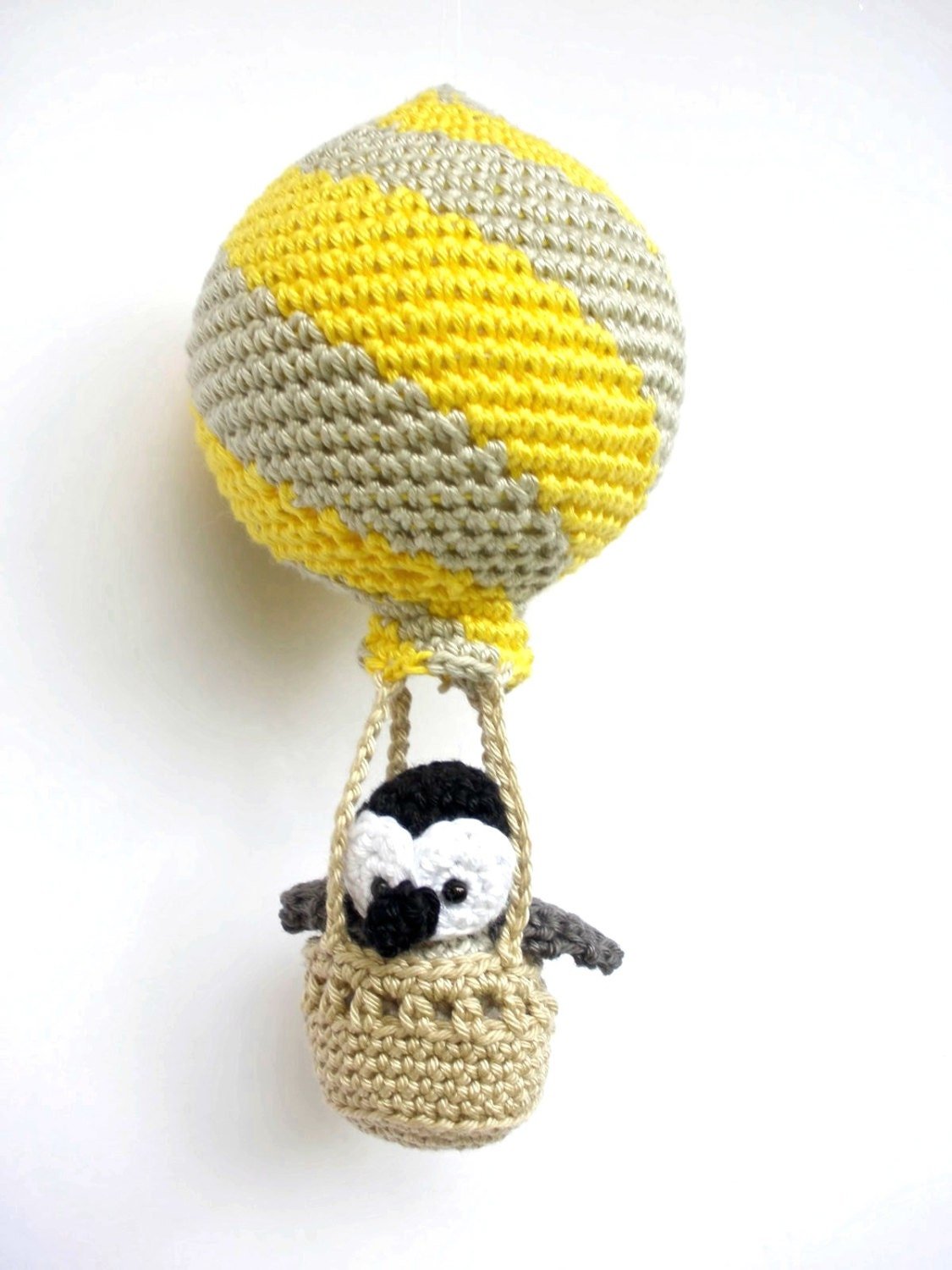 Penguin in a yellow hot air balloon nursery decoration - Crochet on a tree