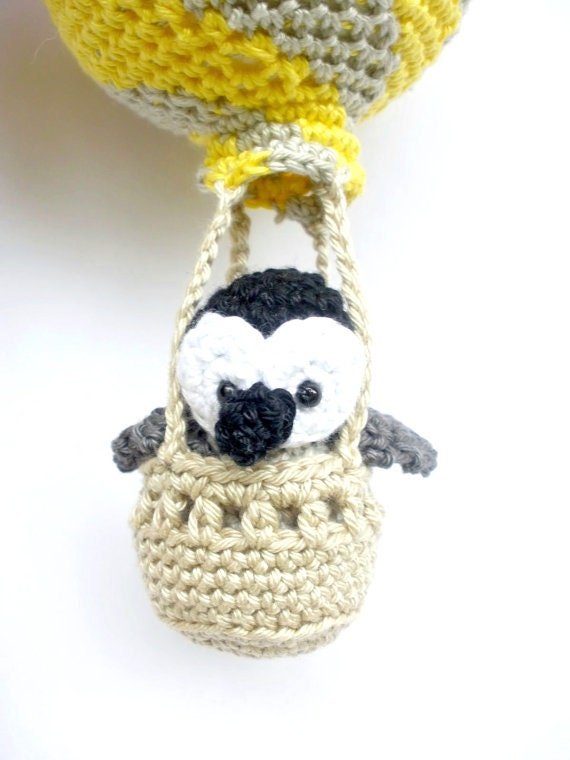 Penguin in a yellow hot air balloon nursery decoration - Crochet on a tree