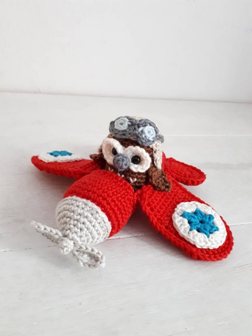 Red airplane with owl stuffed toy - Crochet on a tree